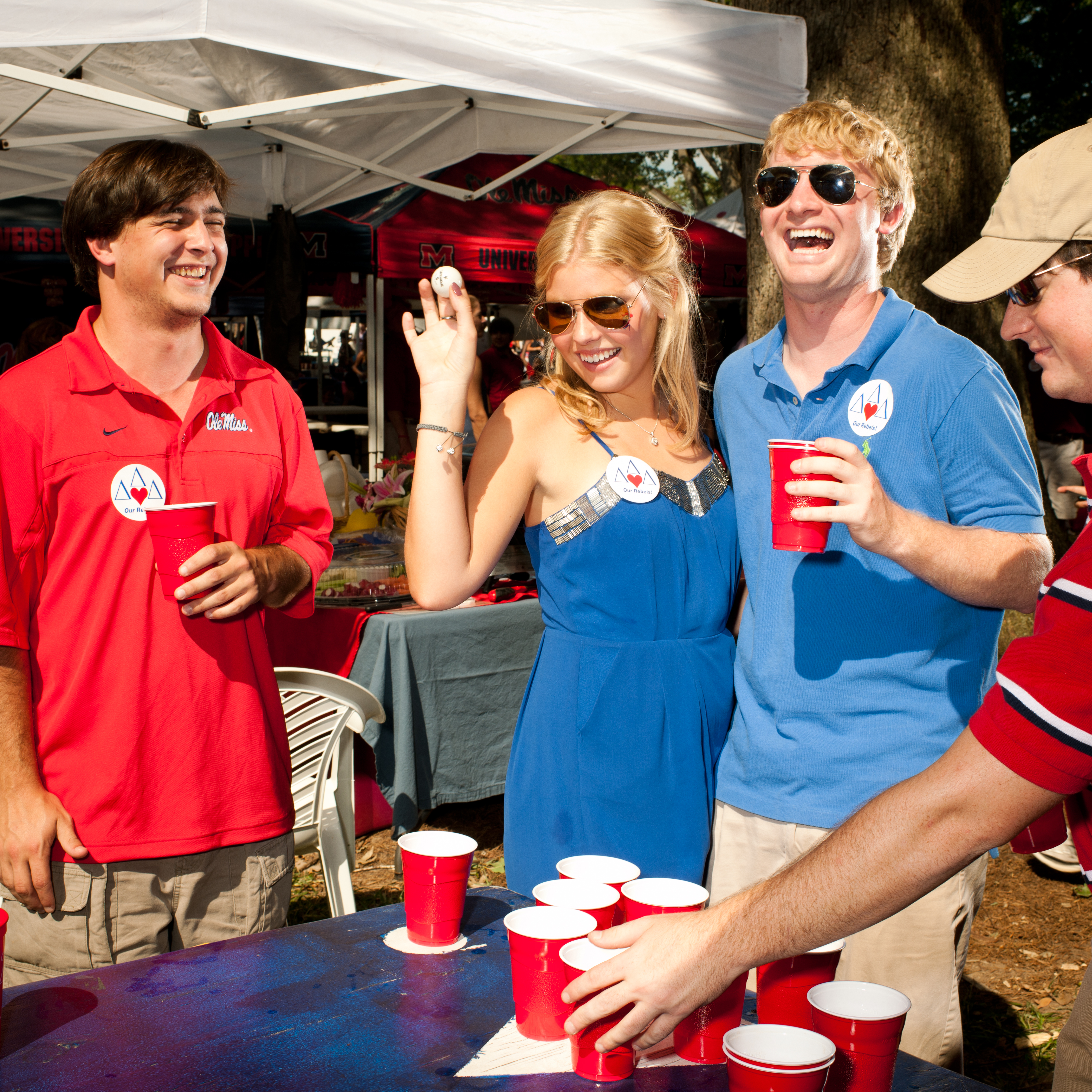 <strong>The total attendance for 835 NCAA Division I football games in the 2012-13 season was a little more than 38 million, with a per-game attendance of 46,000, making it the second most popular spectator sport in America," <a href="http://time.com/college-football-popularity/" title="How College Football Sacked the NBA and MLB" target="_blank">Money recently reported</a>. At these events, there are an estimated 50 million tailgaters in the US, as recorded by <a href="http://www.nationwide.com/tailgating-history-statistics.jsp" title="Nationwide Mutual Insurance Company" target="_blank">Nationwide Mutual Insurance Company</a>. 35% of them are so devoted to the pre-game event that they never actually enter the stadium.</strong>
Title: "Untitled [Ole Miss #171)," from the series <a href="http://brianfinke.com/?portfolio=tailgating" title="Brian Finke - Ole Miss" target="_blank"><em>Ole Miss.</em></a>
In 2011, <a href="http://www.brianfinke.com/" title="Brian Finke" target="_blank">Brian Finke</a> began documenting with wit and humor the <a href="http://espn.go.com/espn/page2/story/_/id/6997931/cfb-nfl-fans-share-their-tailgating-secrets-espn-magazine" title="Tailgating in The Grove at Ole Miss for ESPN" target="_blank">tailgating tradition in The Grove at Ole Miss for <em>ESPN Magazine</em></a>.