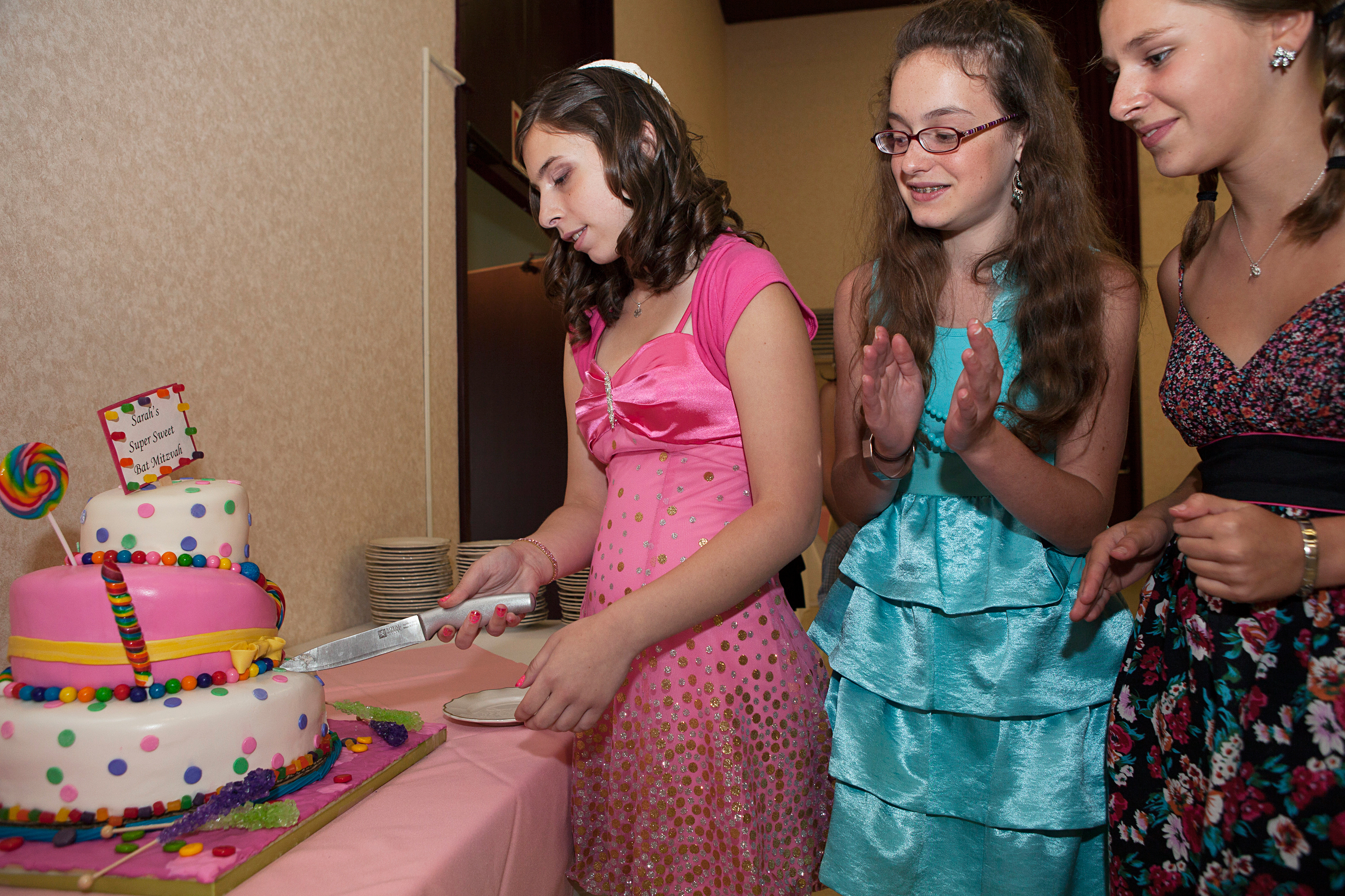 <strong>According to industry estimates, "the average bar or bat mitzvah budget runs roughly $15,000 to $30,000," writes <a href="http://www.emitz.com/budget" title="eMitz.com: the Bar Bat Mitzvah Planning, Ideas, Vendor Reviews and Invitations Site" target="_blank">eMitz.com</a>, the Bar and Bat Mitzvah Planning site. "Many variables come into play, such as: time of year, time of day, number of guests and the region. Manhattan and LA are the priciest."</strong>
Title: "Sarah's Bat Mitzvah, Buffalo, NY," from the series <a href="http://www.rebeccagreenfield.com/#a=0&at=0&mi=2&pt=1&pi=10000&s=0&p=4" title="Coming of Age" target="_blank"><em>Coming of Age.</em></a>
<a href="http://www.rebeccagreenfield.com/" title="Rebecca Greenfield" target="_blank">Rebecca Greenfield</a> has been documenting contemporary American female rites of passage for the past six years, photographing coming of age traditions such as Quinceañeras, Bat Mitzvahs, Debutante Balls, Prom, Homecoming, Sweet Sixteen, Purity Balls, Sorority Rush, Apache Sunrise Dances and more. She looks forward to publishing the project in book form when complete.
