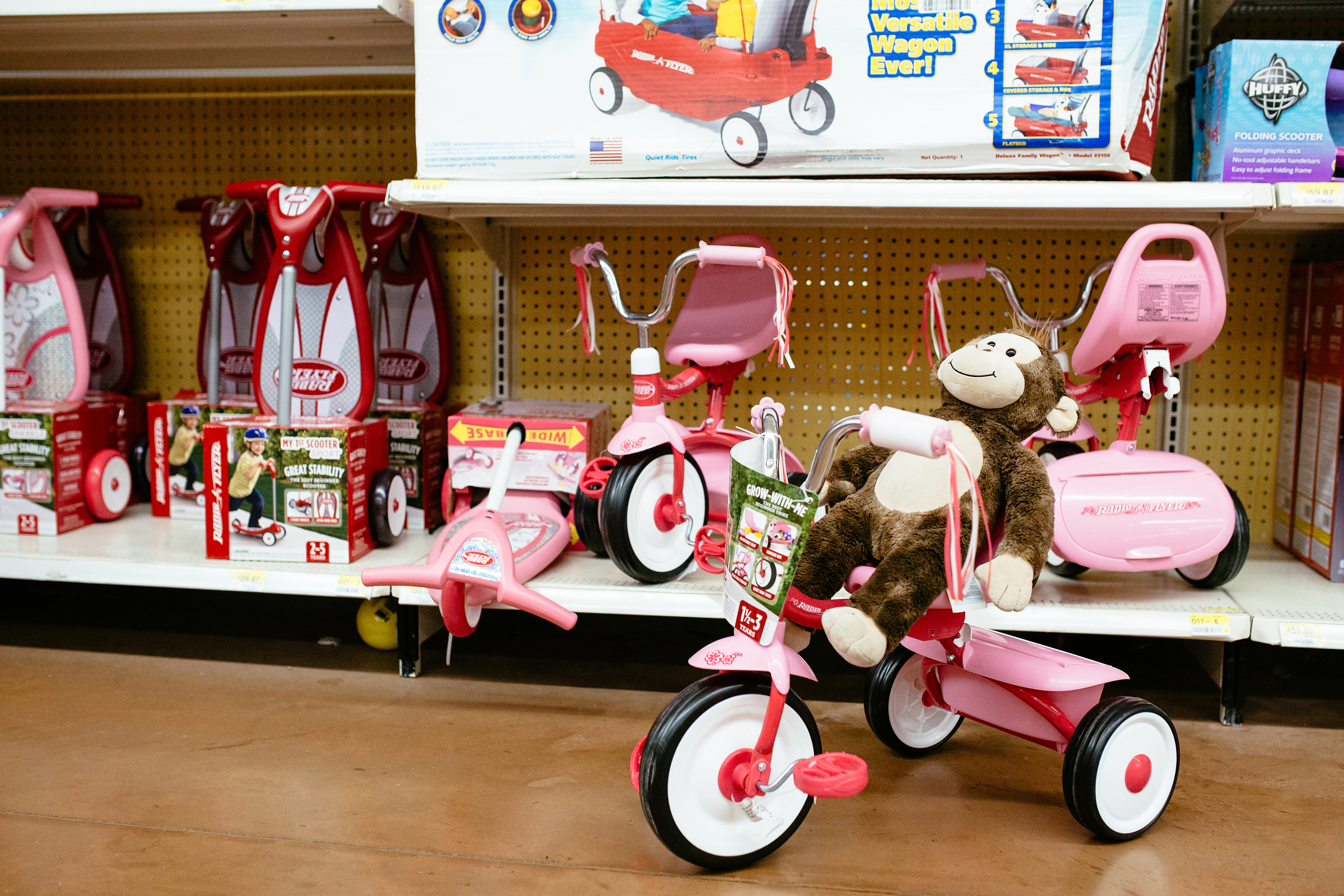 <strong>Three out of four kids ride a bicycle every month, <a href="http://www.safekids.org/sites/default/files/documents/skw_bike_fact_sheet_june_2014.pdf" title="Safe Kids" target="_blank"> Safe Kids </a>reports, but more than half don’t always wear a helmet. "A helmet on the head of a bicyclist between 3-14 years saves society $580, for a cost of only $14 a helmet," according to <a href="http://www.childrenssafetynetwork.org/sites/childrenssafetynetwork.org/files/InjuryPreventionWhatWorks2012.pdf" target="_blank" title="Childrens Safety Network">Childrens Safety Network</a>.</strong>
Title: "Untitled," from the series <a href="http://kidswerehere.wordpress.com/" title="Kids Were Here" target="_blank"><em>Kids Were Here.</em></a>
<a href="http://coliejamesphotography.com/" title="Colie James Photography" target="_blank">Colie James</a> is part of a collaboration among 30 photographers who specifically look for evidence that kids were present without showing them in the frame. Her daughter's monkey, George, got dragged around to buy a new bicycle.