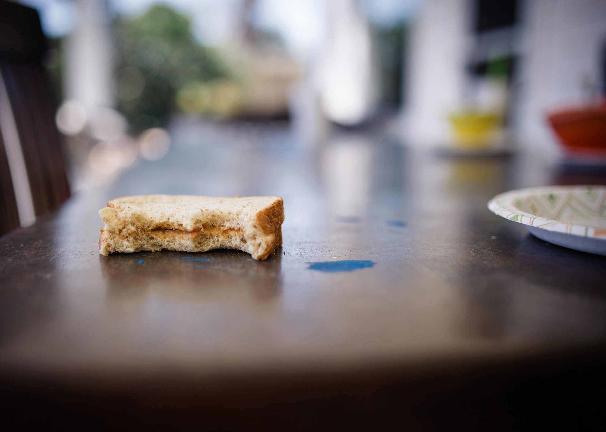 <strong>"The average American child, prior to high school graduation, will scarf down 1,500 peanut butter and jelly sandwiches," boasts the <a href="http://nationalpeanutboard.org/the-facts/fun-facts/" title="National Peanut Board Fun Facts" target="_blank">National Peanut Board</a>, which states that $800 million a year gets shelled out on peanut butter alone.</strong>
Title: "Untitled," from the series <a href="http://kidswerehere.wordpress.com" title="Kids Were Here" target="_blank"><em>Kids Were Here.</em></a>
<a href="http://www.gingerunzueta.com" title="Ginger Unzueta" target="_blank">Ginger Unzueta</a> is part of a collaboration among 30 photographers who specifically look for evidence that children were present without showing them in the frame.