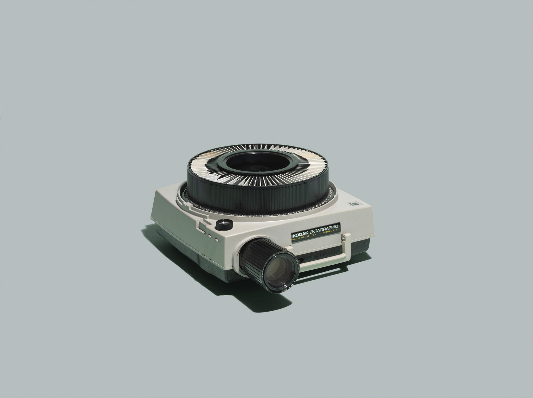 Kodak Ektagraphic Slide Projector, Model B-2. 1982 List Price: $169, per <a href="http://books.google.com/books?id=2Q_myLjG1_0C&pg=PT27&dq=Kodak+Ektagraphic+Slide+Projector,+Model+B-2&hl=en&sa=X&ei=IjkcVOnxCPDhsAT1jYKoBg&ved=0CD0Q6AEwAQ#v=onepage&q=Kodak%20Ektagraphic%20Slide%20Projector%2C%20Model%20B-2&f=false" title="Popular Photography" target="_blank">Popular Photography</a>. <strong>Today's equivalent:</strong> MS PowerPoint, part of Microsoft Office 365 Personal. List Price: $69.99, available at <a href="http://bit.ly/YYjlFX" title="Best Buy" target="_blank">Best Buy</a>.