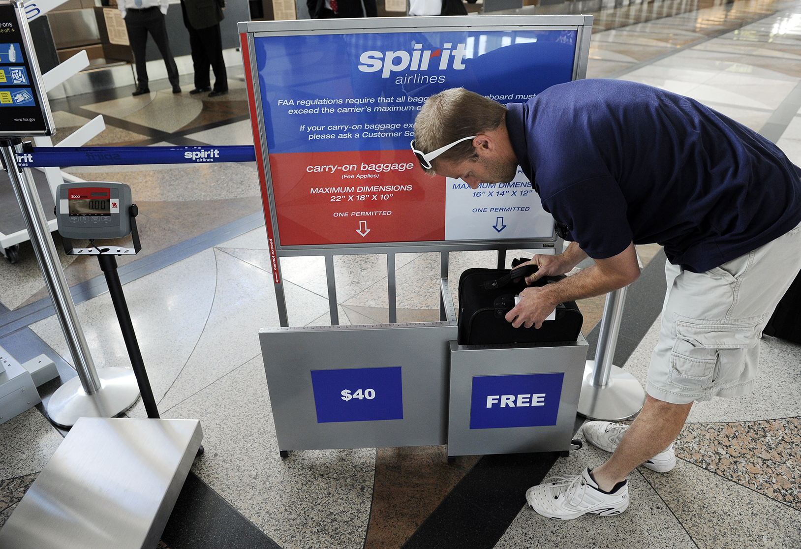 spirit airlines excess baggage fees