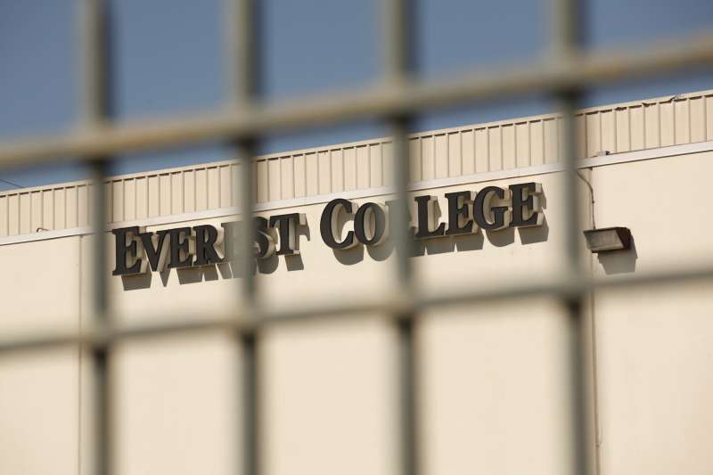 ALHAMBRA, CA - APRIL 27: Everest College is seen through the outer gates on April 27, 2015 in Alhambra, California. Corinthian Colleges Inc., a Santa Ana company that was once one of the nation's largest for-profit college chains, announced that it would be shutting down its remaining two dozen schools effective - a move that leaves 16,000 students scrambling for alternatives. (Photo by Al Seib / Los Angeles Times via Getty Images)
