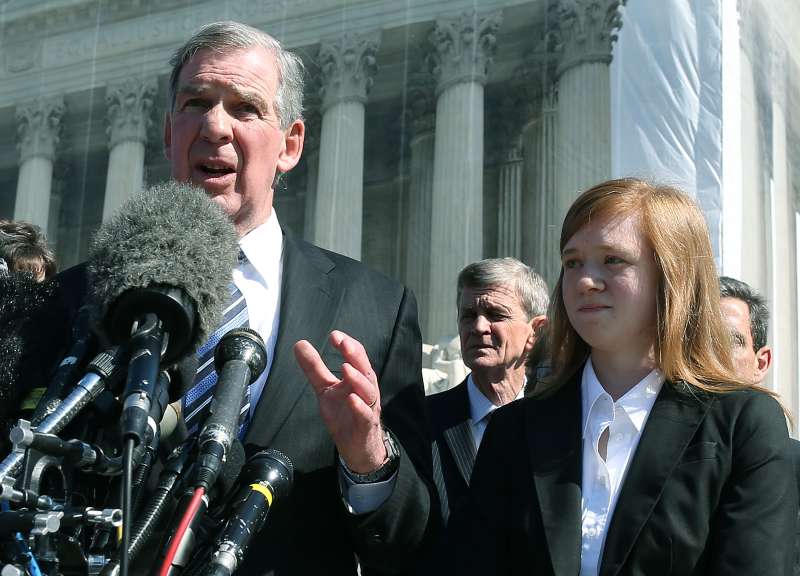 Abigail Fisher stands beside her attorney outside the U.S. Supreme Court in, 2012, when her case first was heard by the high court. On Thursday, the court ruled against Fisher, saying the university's consideration of race in admissions is constitutional. (Photo by Mark Wilson/Getty Images)