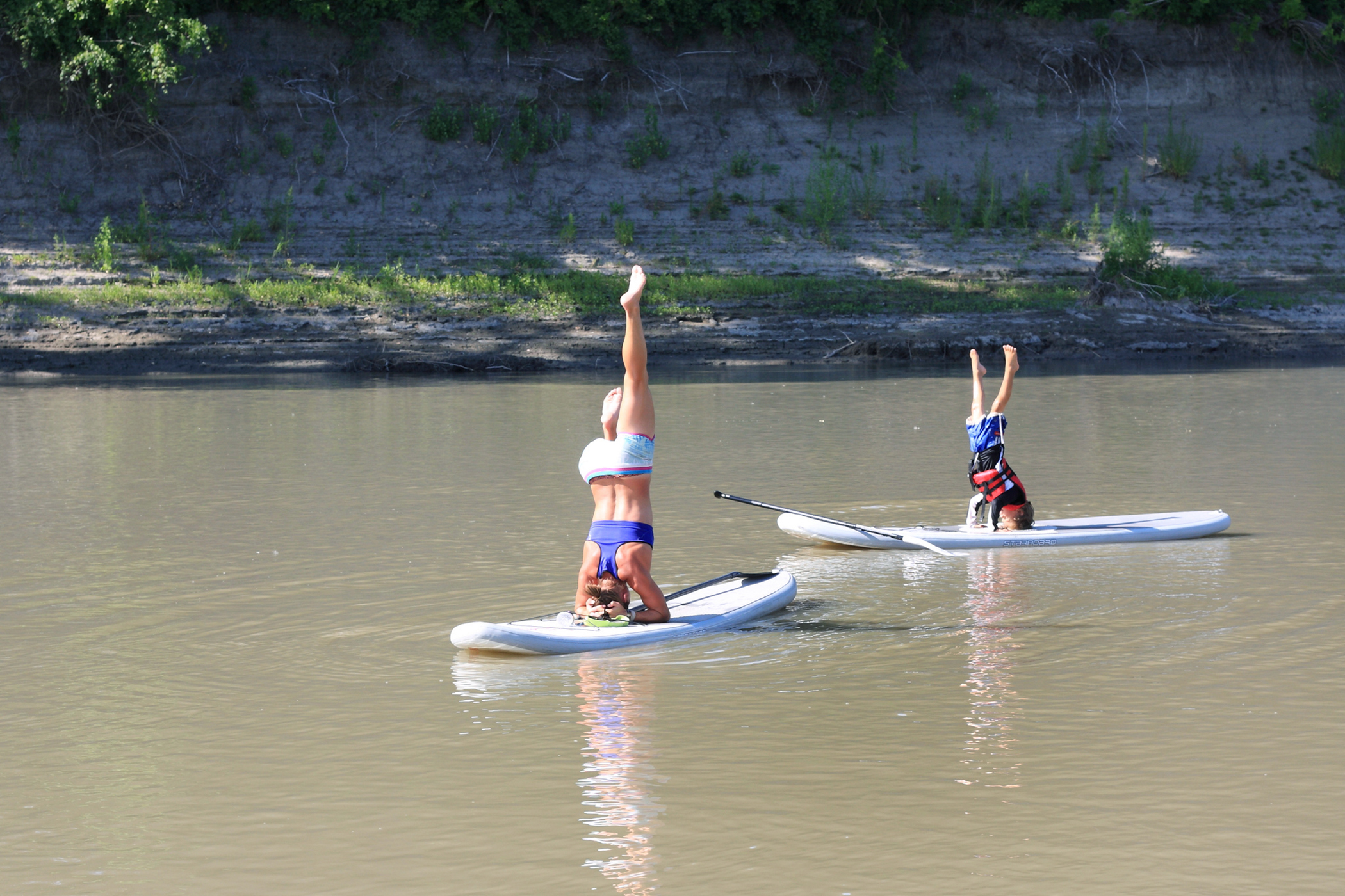 <strong>Grand Forks, North Dakota.</strong> Grand Forks is home to University of North Dakota, the Grand Forks Air Force Base, and a slice of the Red River, which is itself occasionally host to some very talented yoga practitioners.