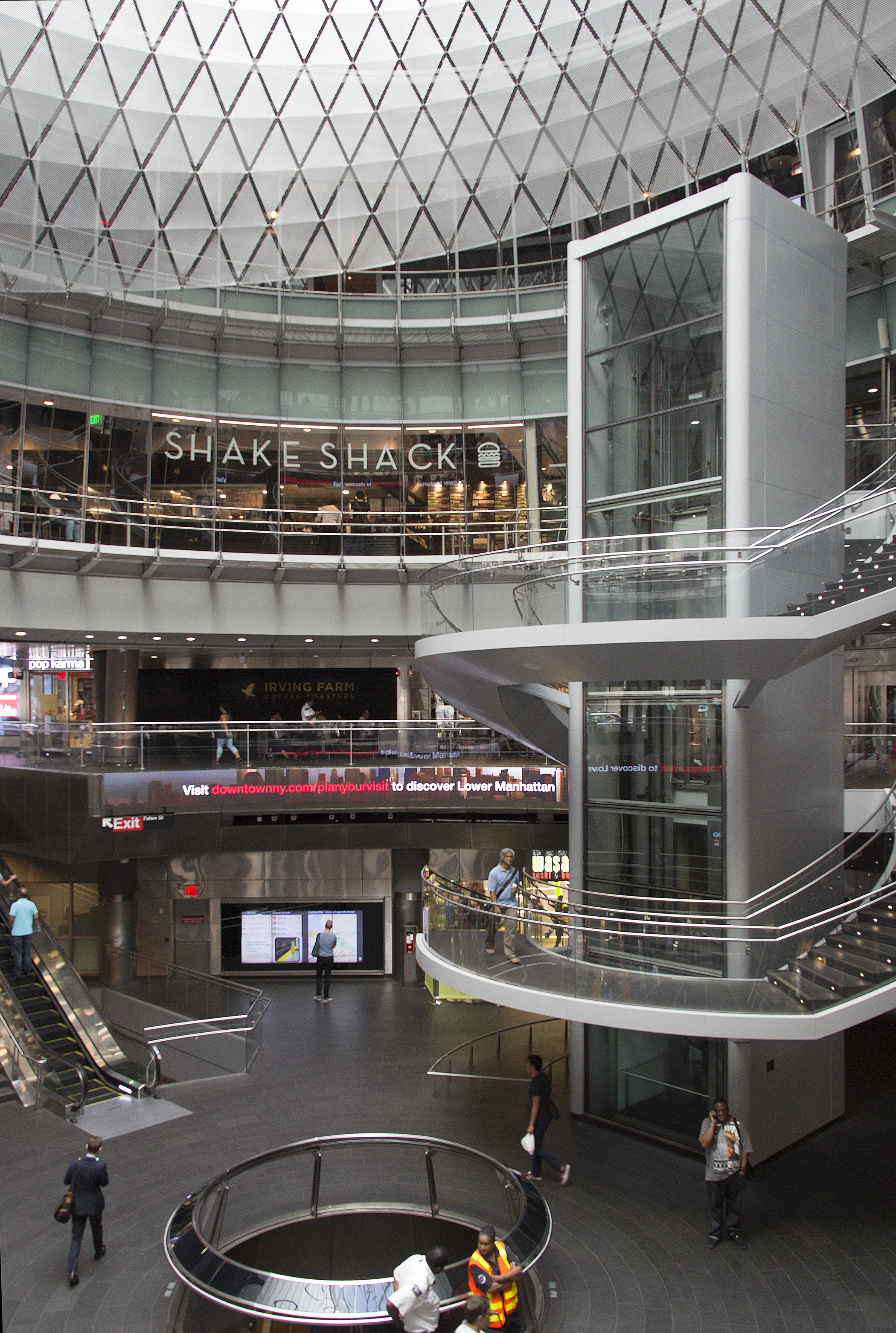 A view of the interior of Fulton Center featuring Shake Shack, Irving Farm and Wasabi Sushi & Bento, New York.