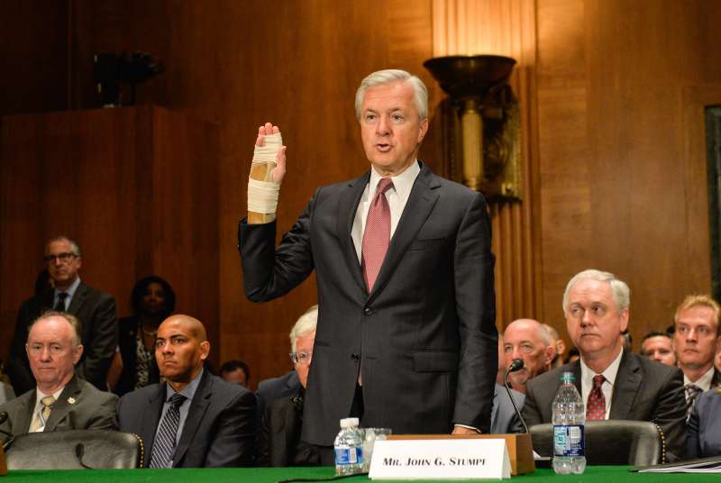 Wells Fargo's chairman and chief executive officer John Stumpf swears an oath before the U.S. Senate Banking Committee on Capitol Hill in Washington D.C. on Sept 20, 2016. U.S. lawmakers grilled Stumpf on Tuesday over the bank's fake account scandal as he declined to support clawing back executive compensation.
