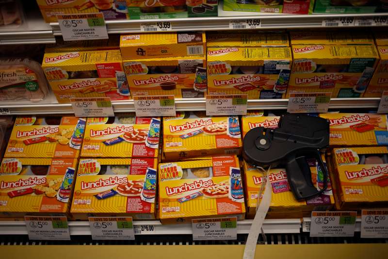 A price gun sits on top of packages of Oscar Mayer Co. Lunchables at a Publix Super Markets Inc. grocery store in Knoxville, Tennessee, U.S., on Wednesday, March 5, 2014. Publix's sales for the fourth quarter of 2013, were $7.4billion, a 5.3 percent increase from last year's $7.0 billion. Photographer: Luke Sharrett/Bloomberg via Getty Images