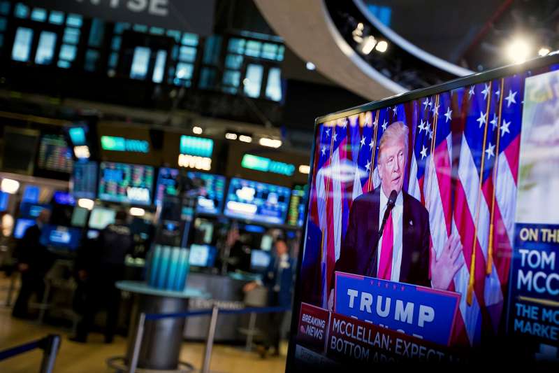 U.S. President-elect Donald Trump is seen speaking on a television on the floor of the New York Stock Exchange (NYSE) in New York, on Wednesday, Nov. 9, 2016. U.S. stocks fluctuated in volatile trading in the aftermath of Trump's surprise presidential election win, as speculation the Republican will pursue business-friendly policies offset some of the broader uncertainty surrounding his ascent.