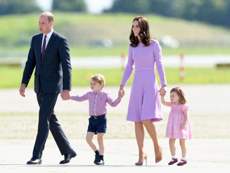 Prince William, Duke of Cambridge, Prince George, Princess Charlotte of Cambridge and Catherine, Duchess of Cambridge view helicopter models H145 and H135 before departing from Hamburg airport on the last day of their official visit to Poland and Germany on July 21, 2017 in Hamburg, Germany.