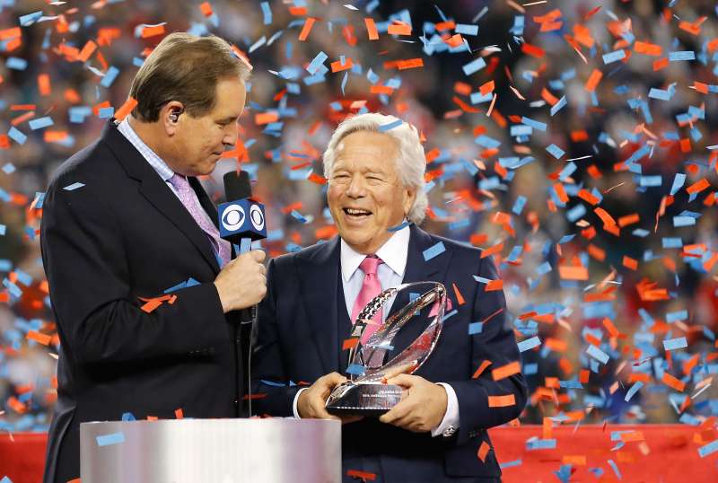 FOXBOROUGH, MA - JANUARY 21: Owner Robert Kraft of the New England Patriots holds the Lamar Hunt trophy as he is interviewed by Jim Nantz after the AFC Championship Game against the Jacksonville Jaguars at Gillette Stadium on January 21, 2018 in Foxborough, Massachusetts. (Photo by Jim Rogash/Getty Images)