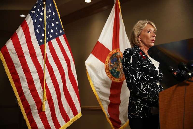 U.S. Education Secretary Betsy DeVos speaks to the news during a press conference held at the Heron Bay Marriott about her visit to Marjory Stoneman Douglas High School in Parkland on March 7, 2018 in Coral Springs, Florida. DeVos was visiting the high school following the February 14 shooting that killed 17 people.