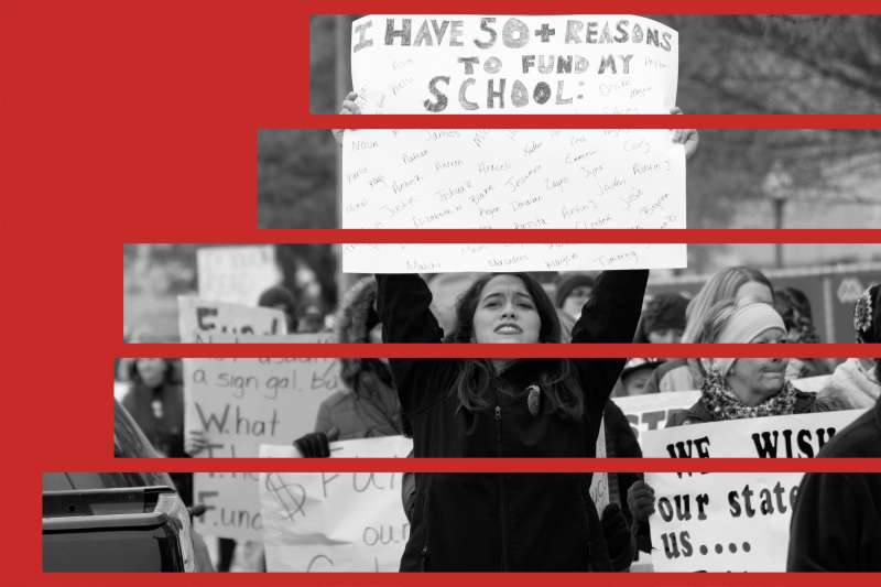 An Oklahoma teacher walks the picket line at the state capitol on April 2, 2018 in Oklahoma City, Oklahoma. Thousands of teachers and supporters are scheduled to rally Monday at the state Capitol calling for higher wages and better school funding. Teachers are walking off the job after a $6,100 pay raise was rushed through the Legislature and signed into law by Gov. Mary Fallin.