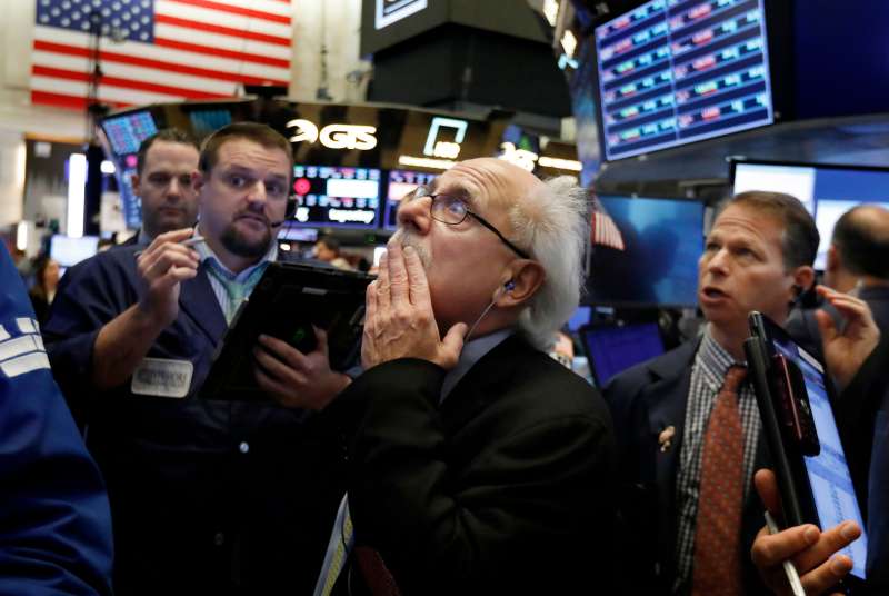 Peter Tuchman, center, works with fellow traders on the floor of the New York Stock Exchange, . Stocks are opening broadly lower on Wall Street, a day after a massive surge, as a number of big companies reported disappointing results
Financial Markets Wall Street, New York, October 26, 2018.