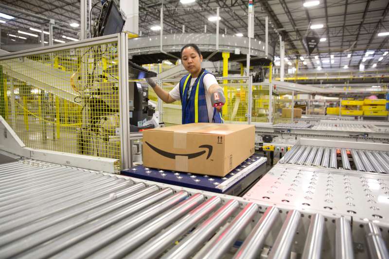 1.25 million square foot Amazon shipping center in Schertz, Texas. The fulfillment facility includes a proprietary robo-stow robotic arm system and employs nearly 500 full-time employees who use the advance tracking system to package orders and place into large tractor trailers for delivery.