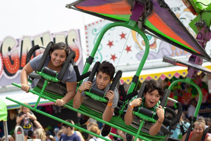 Children on a fair ride in Shawnee, Kansas