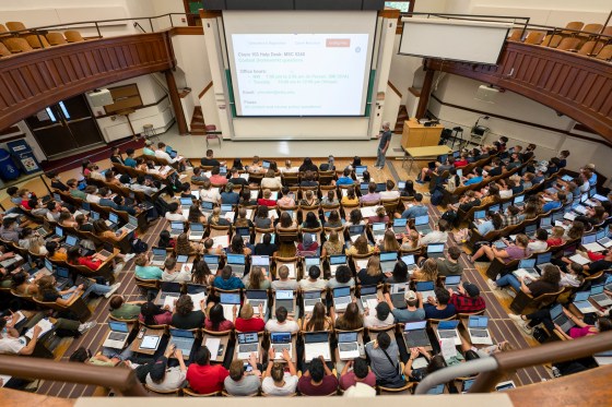 Students follow along with the lecture on their laptop computers on the first day of Chemistry 103 in Agricultural Hall at the University of Wisconsin-Madison