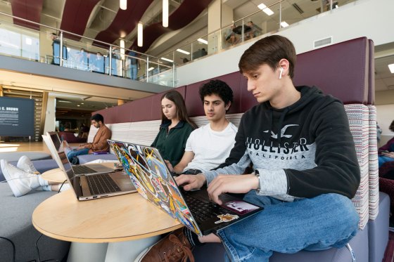 Group of students working on their computers at Texas A&M University College Station