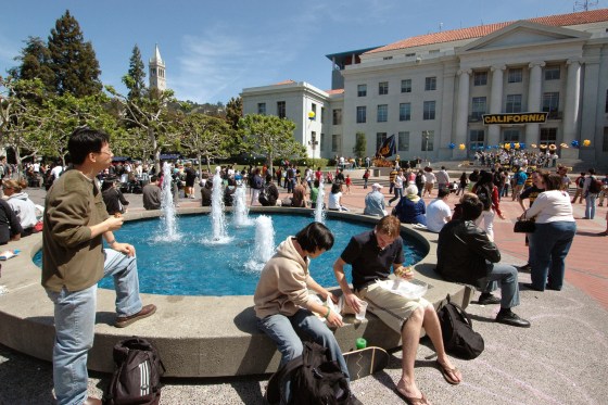Students gathered at a fountain at the University of California Berkeley