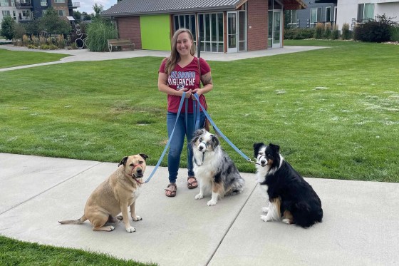 Vee Weir with her dogs Teddy, Harley, and Scarlett.